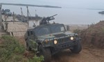 Despliegue del Ejército en costa chaqueña: artillería, botes y Hummer sobre el Paraná.